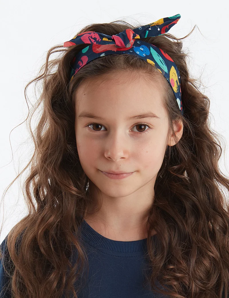 دينوكيدس طوق شعر بالزهور